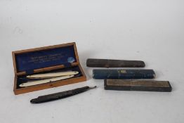 Six cut throat razors, to include two Wade & Butcher Sheffield housed in a Gentlemen's Companion