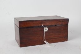 George IV rosewood tea caddy, the hinged lid opening to reveal central cut glass bowl flanked by two