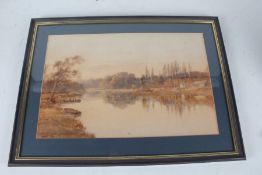 Edward Arden Tucker (1830-1909) - a view of a river with figures and buildings, watercolour,