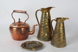 Two brass ware jugs with scale decoration by J.S & S together with a copper kettle with swan neck