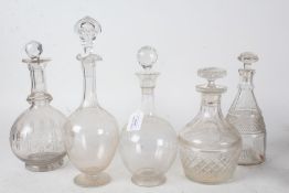 Five Victorian and later glass decanters, the tallest 33cm high (5)