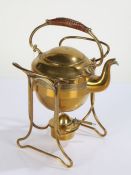 Arts and Crafts design Bavarian brass spirit kettle on stand, having wicker carrying handle, the