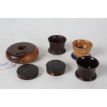 Collection of treen, to include two lignum vitae seal cases, two lignum vitae salts, a painted