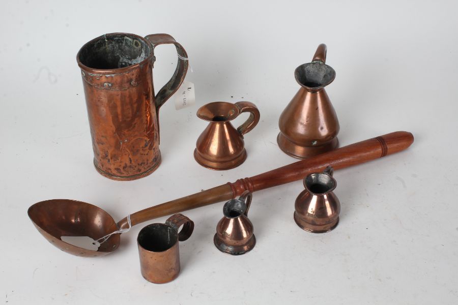 Copper ware to include 1/2 pint, gill, 1/2 and 1/4 gill measures, large and small cups, copper spoon