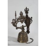 20th Century brass bell and bracket, mounted with a figure and a pair of lions above a bell with a