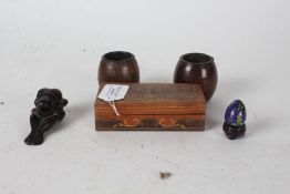 Pair of treen match holders, small cloisonné egg and stand, carved stone figure, small marquetry