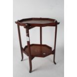 Oriental Hardwood folding occasional table, with two detachable tray tiers, 49cm wide, 42.5cm