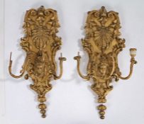 Pair of 19th Century gilt gesso composition girandoles, each with three branches, lacking sconces,