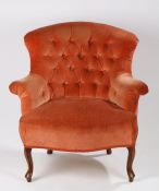 Victorian mahogany button back armchair, the wide curved wingback with splayed scrolling arms