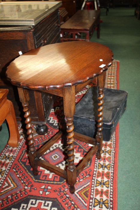 Side table with barley twist legs, together with a leather case