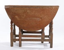 18th Century oak gateleg table, the oval drop leaf top above turned legs and frieze drawer, 90cm