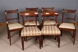 Pair of Victorian mahogany bar back dining chairs, with carved back rails, stuff over seats and