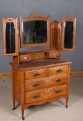 Edwardian satinwood dressing chest, the upper section with triptych mirrors and two box drawers,