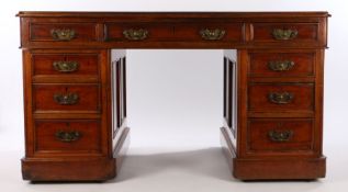 Victorian mahogany kneehole desk, the rectangular top with inset leather above nine drawers to the