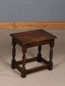 17th century style oak joint stool, the rectangular top raised on turned knopped legs, 48cm wide