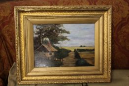 Early 20th century, landscape study of a country house, unsigned oil on canvas, housed within a gilt