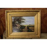 Early 20th century, landscape study of a country house, unsigned oil on canvas, housed within a gilt