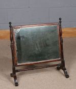 19th century mahogany swing framed toilet mirror, raised on scroll legs, 54.5cm wide