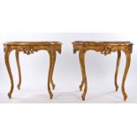Louis XVI style pair of marble and gilt wood centre tables, the shaped marble tops (one with