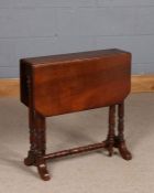 Late Victorian mahogany sutherland table, raised on ring turned legs, 60.5cm high