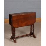 Late Victorian mahogany sutherland table, raised on ring turned legs, 60.5cm high