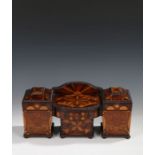 An exceptional Regency specimen wood tea caddy, modelled as a sideboard with gadrooned edges to