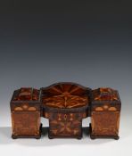 An exceptional Regency specimen wood tea caddy, modelled as a sideboard with gadrooned edges to