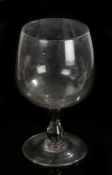 Very large and decorative wine glass, the bowl above the stem and wide foot with rough pontil