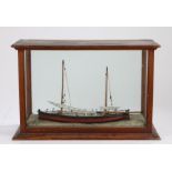 Model of a two masted ship "Friend of all Nations", housed in a glazed stained pine case, 58cm wide,