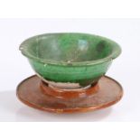 Chinese Liao green glazed bowl, Liao Dynasty (907 - 1125) with an arched lip above the tapered body,