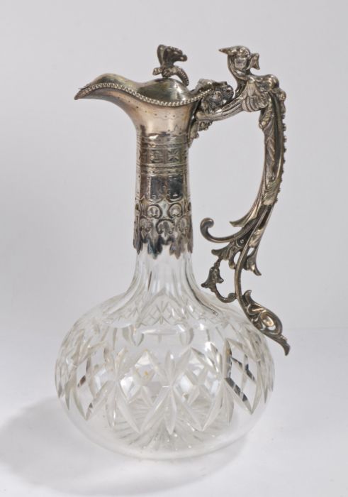 Victorian silver plate mounted claret jug, the pierced beaded and scroll handle with mythical