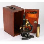 Spencer monocular microscope, number 58533, with ebonised and brass body, retailers label for
