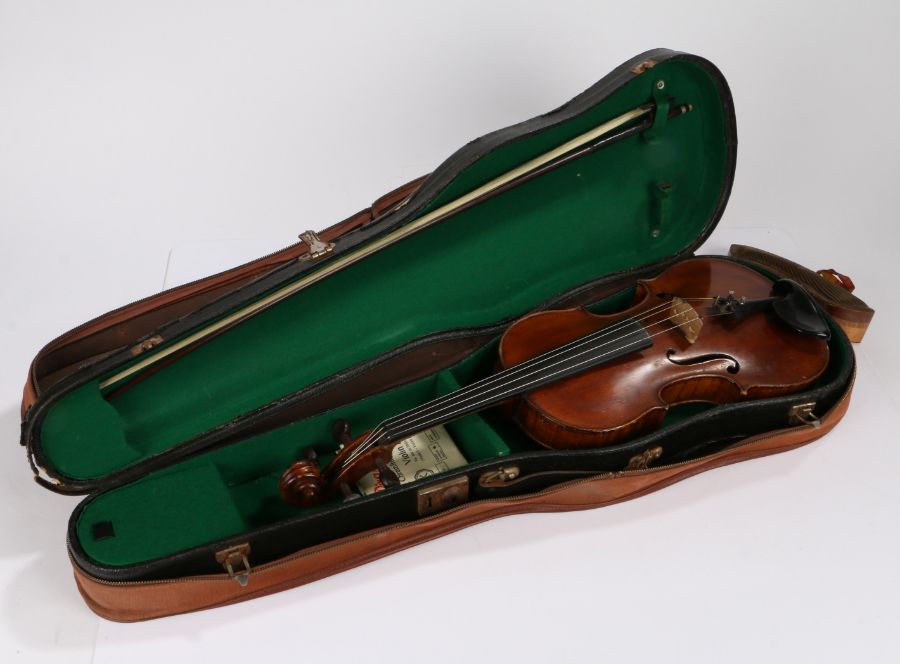 20th Century violin, the interior with label "Re-constructed by W Vaus Hackney London May 1926",