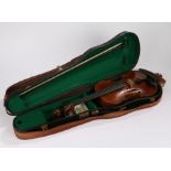 20th Century violin, the interior with label "Re-constructed by W Vaus Hackney London May 1926",