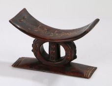 Ethiopia Oromo headrest, with dot and cross design to the arched rest above the squat circular