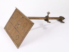 Brass lectern, the angled book support with black inlaid decoration, on an adjustable stem, 35.5cm