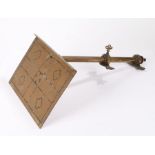 Brass lectern, the angled book support with black inlaid decoration, on an adjustable stem, 35.5cm