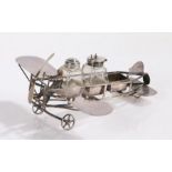 Silver plated novelty condiment set, maker MW & S, modelled as an early aeroplane, with central
