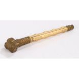 19th Century ivory and brass parasol or cane handle, the foliate decorated pommel and tapering lower