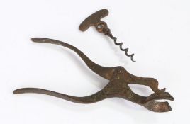 Mid 19th Century steel lever corkscrew, the handle with central cast section bearing a crest above