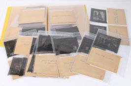 Album containing large format press negatives depicting the royal family, to include Queen Elizabeth