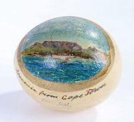 Souvenir from Cape Town, a South African decorated ostrich egg with ships in front of table