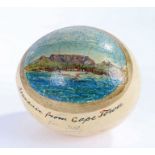 Souvenir from Cape Town, a South African decorated ostrich egg with ships in front of table