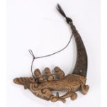Sumatra, Batak medicine horn, also known as a Naga morsarang, the wooden head carved with a beast