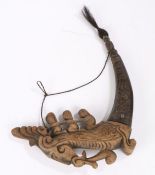 Sumatra, Batak medicine horn, also known as a Naga morsarang, the wooden head carved with a beast