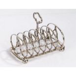 SS Great Britain interest- Silver plated six division toast rack, the pierced quatrefoil handle