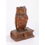 Black Forest style inkwell, modelled as an owl perched on a book, the hinged lid opening to reveal a