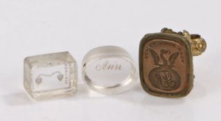 Three fob seals, to include oval glass example engraved "ANN", rectangular glass example engraved "