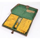 Chinese "Four Winds" Mahjong game, the leather case opening to reveal five interior trays containing