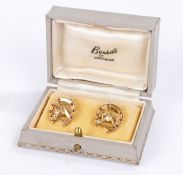 Pair of gold coloured metal cufflinks, the terminals depicting a horseshoe with central horses head,